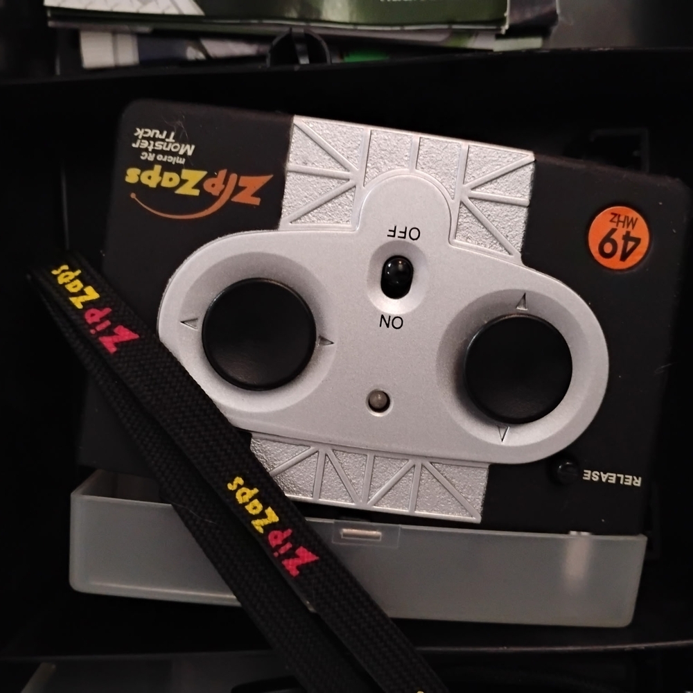 Zip Zaps Lot, Monster Truck, Herbie Fully Loaded VW, controllers , case, access. - Picture 5 of 8
